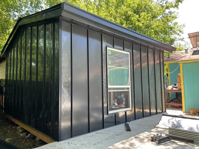 Black standing seam metal wall panels for Metal Roof Installation in Hoschton