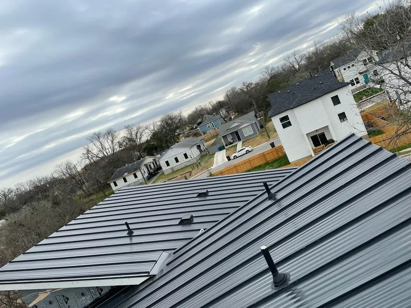 Standing seam metal roof panels with vents for Skylight Repair in Hoschton